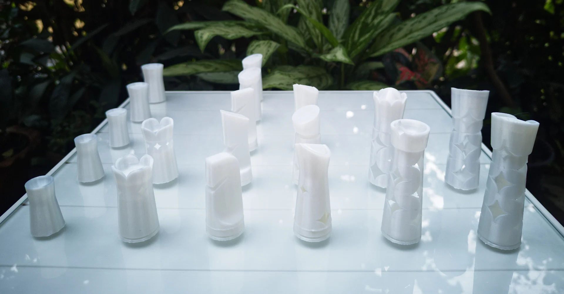 The printed set laid out on glass